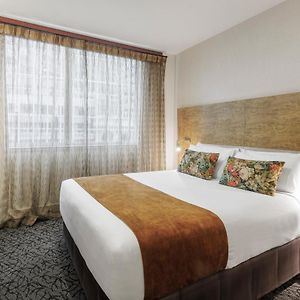 Executive Two-Bedroom Suite One Queen Two Single Beds